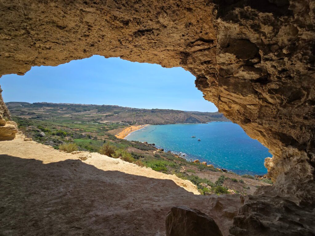Rugged cave overlooking sea and beach