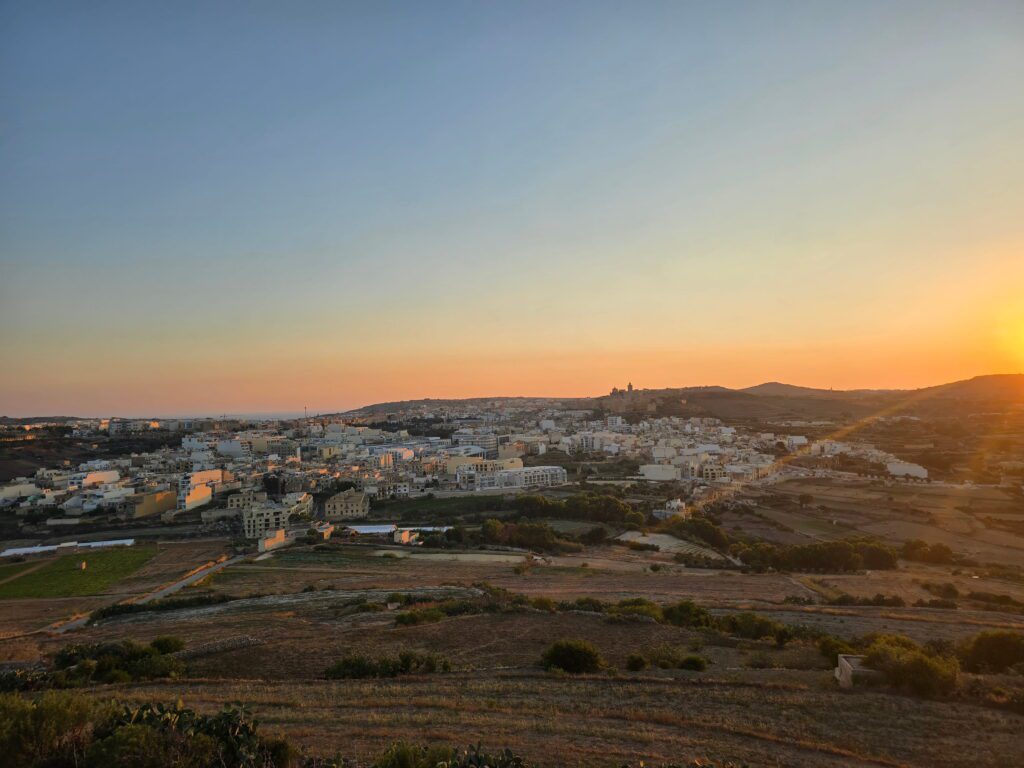 Orange sky in overlooking Gozo