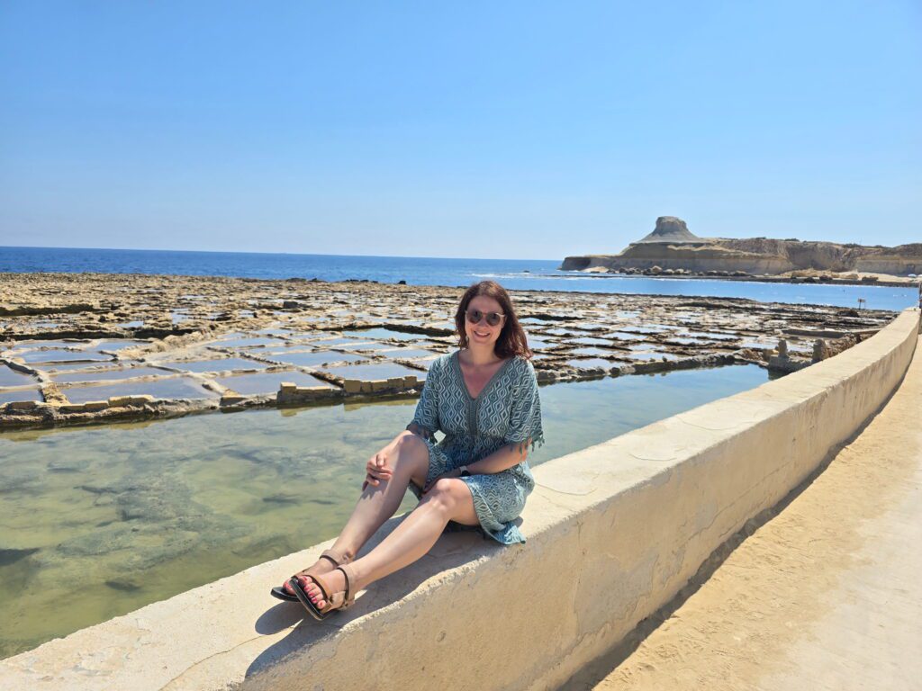 Salt panes carved in rocks surrounded by sea